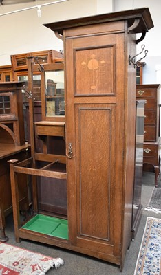 Lot 1328 - An Arts & Crafts Oak Hall Stand / Robe, the...