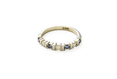 Lot 460 - A Sapphire and Diamond Half Hoop Ring, four...