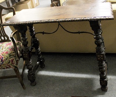 Lot 1424 - A Spanish Style Carved Table, on turned and...