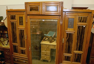 Lot 1339 - An A.J. Lamb Mirrored Breakfront Wardrobe,...