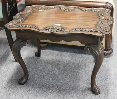 Lot 1423 - A Carved Mahogany Coffee Table decorated with...