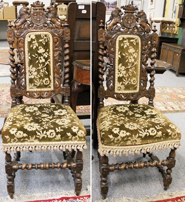 Lot 1381 - A Pair of Victorian Carved Oak Hall Chairs...