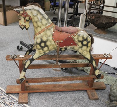 Lot 1432 - A Dapple Grey Painted Wooden Rocking Horse, on...