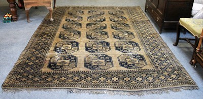 Lot 210 - Afghan Carpet, the gold field with three...