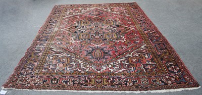 Lot 211 - Heriz Carpet, the strawberry field centred by...