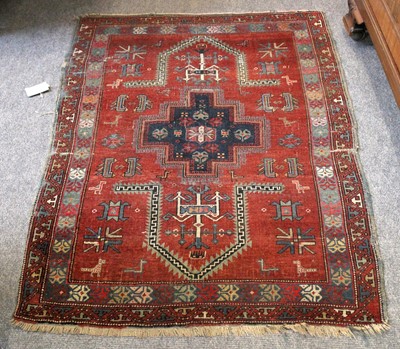 Lot 215 - An Unusual Karabagh Rug, the madder field with...