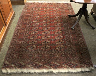 Lot 1155 - Tekke Rug, the madder field with three columns...