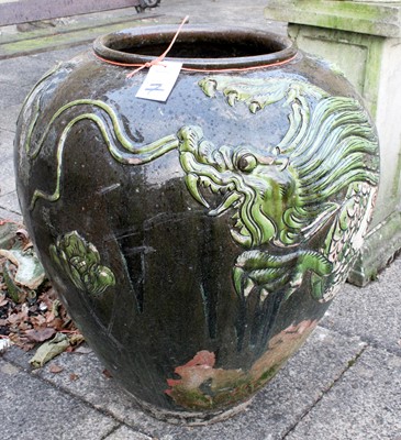 Lot 1206 - An Oriental Glazed Terracotta Urn, of ovoid...