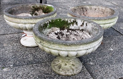 Lot 1208 - Three Composition Pedestal Garden Planters, of...