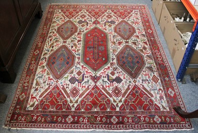 Lot 219 - Afshar Rug, the ivory field of zoomorphic...