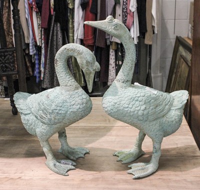 Lot 1463 - A Pair of Cast Metal Garden Statues, formed as...