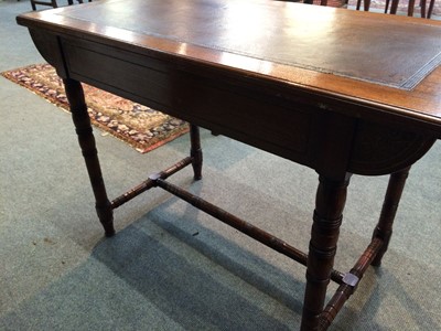 Lot 15 - A Late Victorian Walnut Writing Table, with...