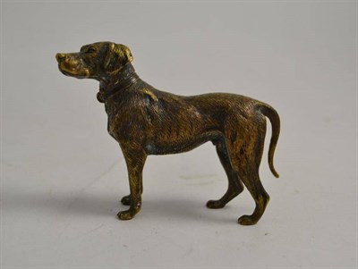 Lot 2 - A cast figure of a dog