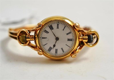 Lot 4 - An 18ct small gold ladies watch on a bracelet mount