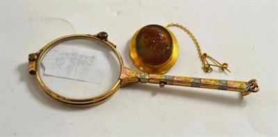 Lot 17 - A pair of lorgnettes and a cameo brooch with setting stamped '18c'