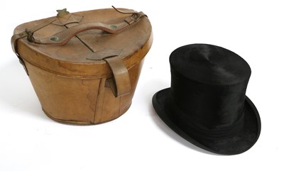 Lot 2218 - A Henry Heath Black Silk Top Hat in a Fitted...