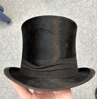 Lot 2218 - A Henry Heath Black Silk Top Hat in a Fitted...