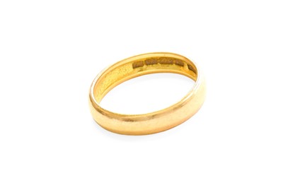 Lot 391 - A 22 Carat Gold Band Ring, finger size P