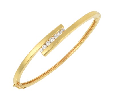 Lot 2245 - An 18 Carat Gold Diamond Bangle the yellow...