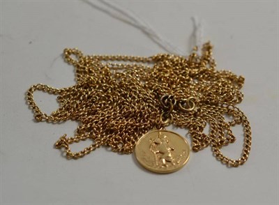 Lot 34 - A 9ct gold St Christopher charm on long length chain