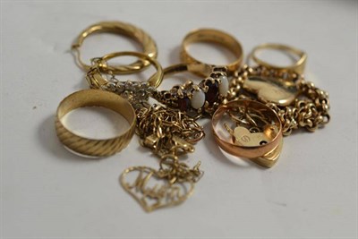 Lot 35 - A bracelet with clasp stamped 375, six dress rings stamped 375, etc
