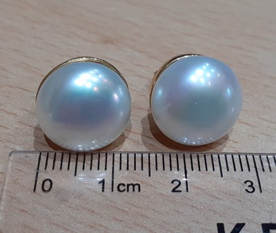 Lot 2248 - A Cultured Pearl, Sapphire and Diamond...