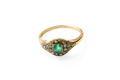 Lot 337 - An Emerald and Diamond Cluster Ring, the...