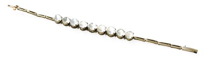 Lot 339 - A Moonstone Bracelet, nine round cabochon...