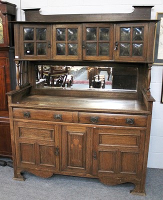 Lot 4 - An Oak Arts & Crafts Dresser, the raised...