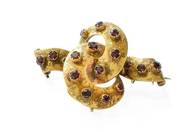 Lot 345 - A Garnet Brooch/Pendant, the yellow engraved...