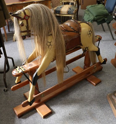 Lot 1104 - Modern Dappled Rocking Horse, on treadle base,...