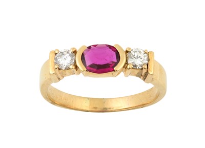 Lot 2043 - A Synthetic Ruby and Diamond Three Stone Ring...