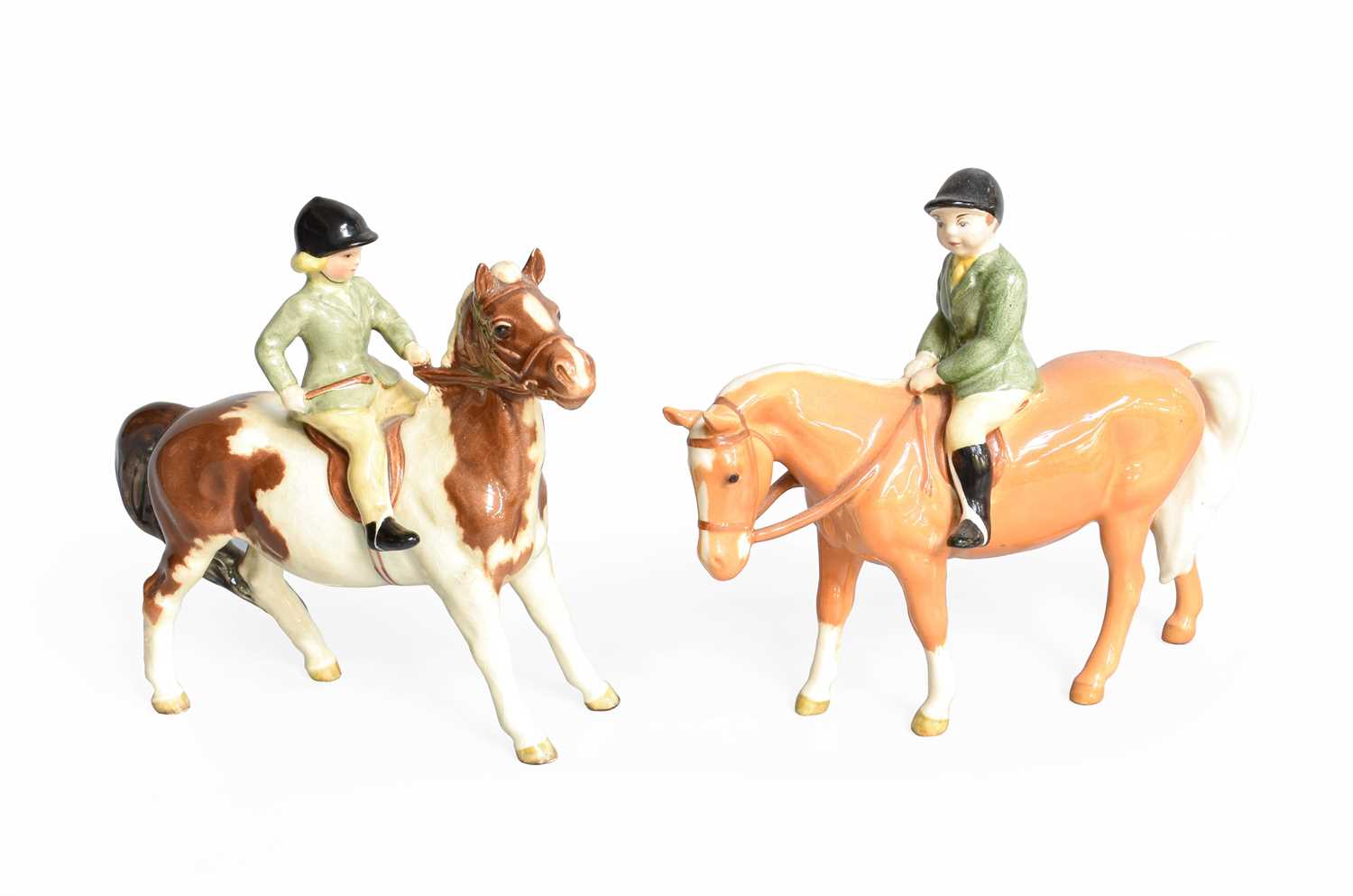 Lot 141 - Beswick Girl on Pony, model No. 1499, skewbald...