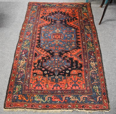 Lot 1030 - Kurdish Rug, the midnight blue field with...