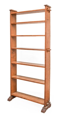 Lot 187 - An Arts & Crafts Oak Open Pegged Bookcase, the...