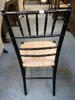 Lot 68 - A Set of Three Ebonised Sussex Chairs, with...
