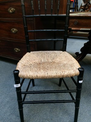 Lot 68 - A Set of Three Ebonised Sussex Chairs, with...