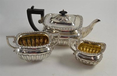 Lot 73 - An Edwardian silver three piece tea service, Birmingham 1908