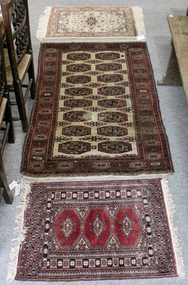 Lot 201 - Afghan Tekke Rug, the ivory field with two...