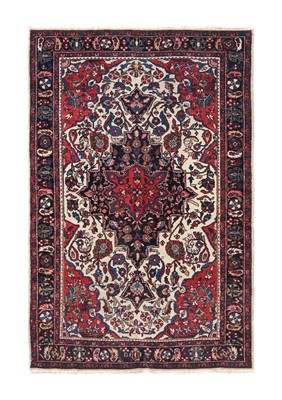 Lot 366 - West Persian Village Rug, circa 1940 The ivory...