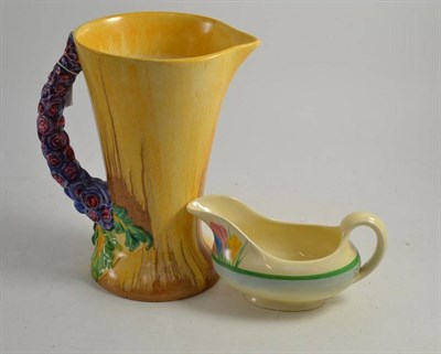 Lot 79 - A Clarice Cliff jug, 'My Garden' pattern, and a Wilkinsons honeyglaze jug