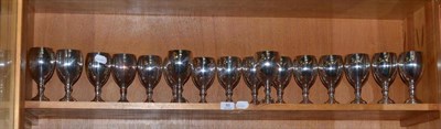 Lot 88 - A set of seventeen silver on copper wine goblets