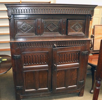 Lot 98 - An 18th Century Carved Oak Court Cupboard,...