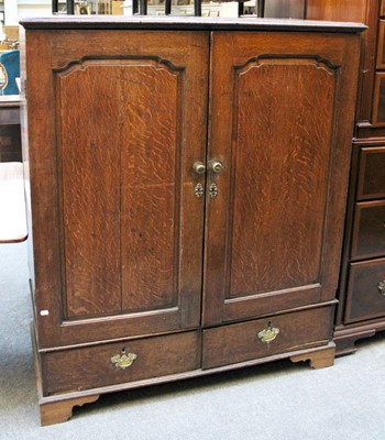 Lot 74 - An 18th Century Oak Cupboard with two moulded...
