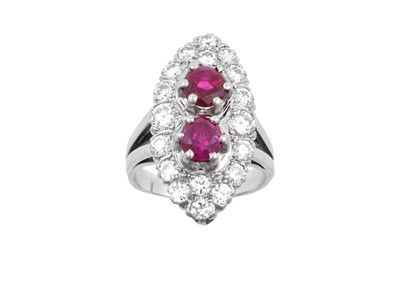 Lot 2250 - A Ruby and Diamond Cluster Ring the navette...