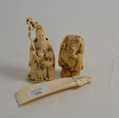 Lot 95 - A late 19th century carved ivory figure of a gentleman with child, another (a.f.) and an ivory shoe