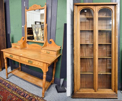 Lot 134 - A Glazed Oak Bookcase with adjustable shelves,...