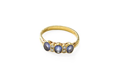 Lot 361 - An 18 Carat Gold Tanzanite and Diamond Ring,...