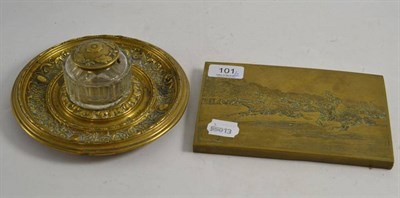Lot 101 - A brass inkwell and a brass plaque racing scene