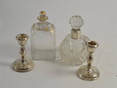 Lot 103 - Silver mounted scent bottle, pair of silver candlesticks and parcel gilt glass bottle